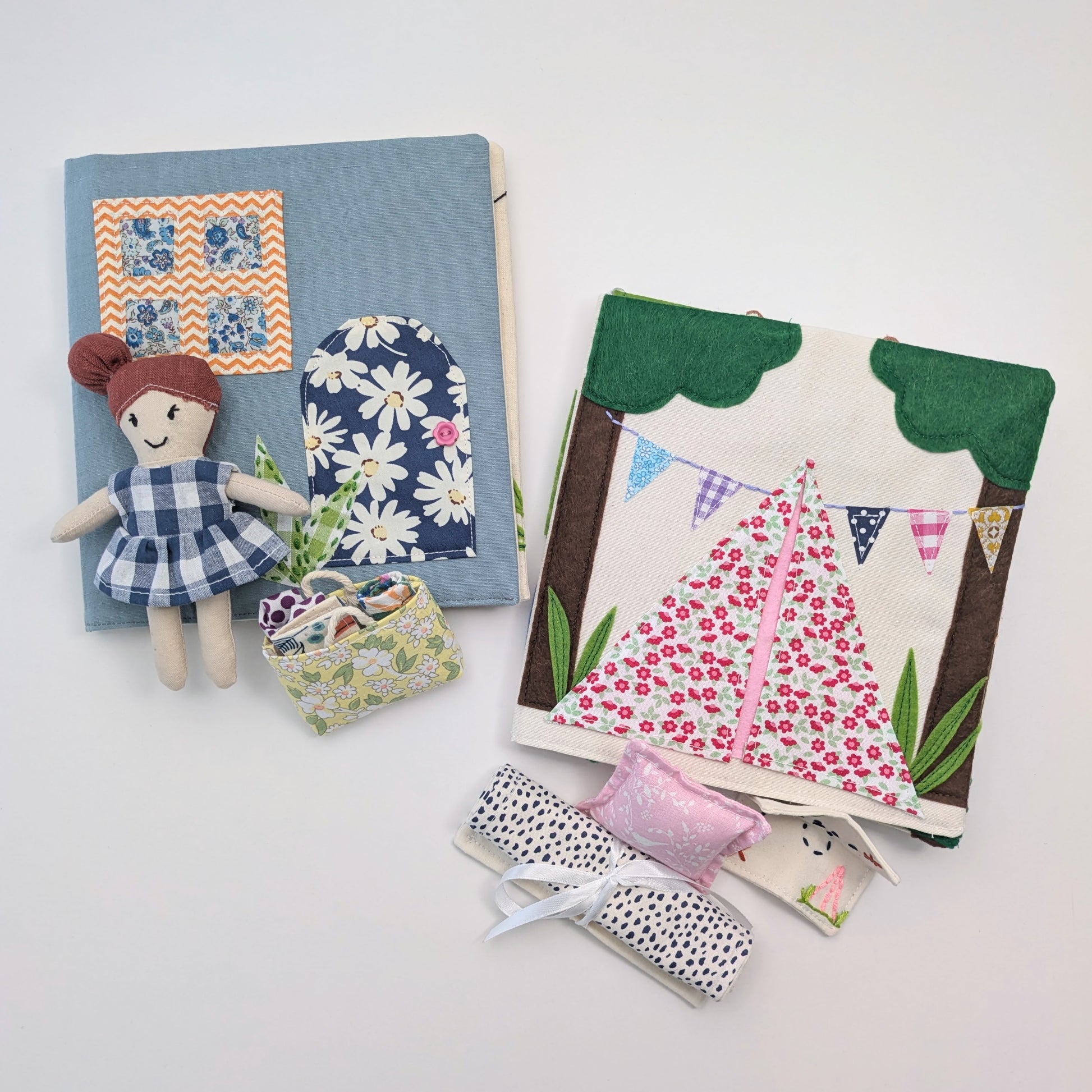 Complete set showing the doll, dollhouse, and Adventure Book together.